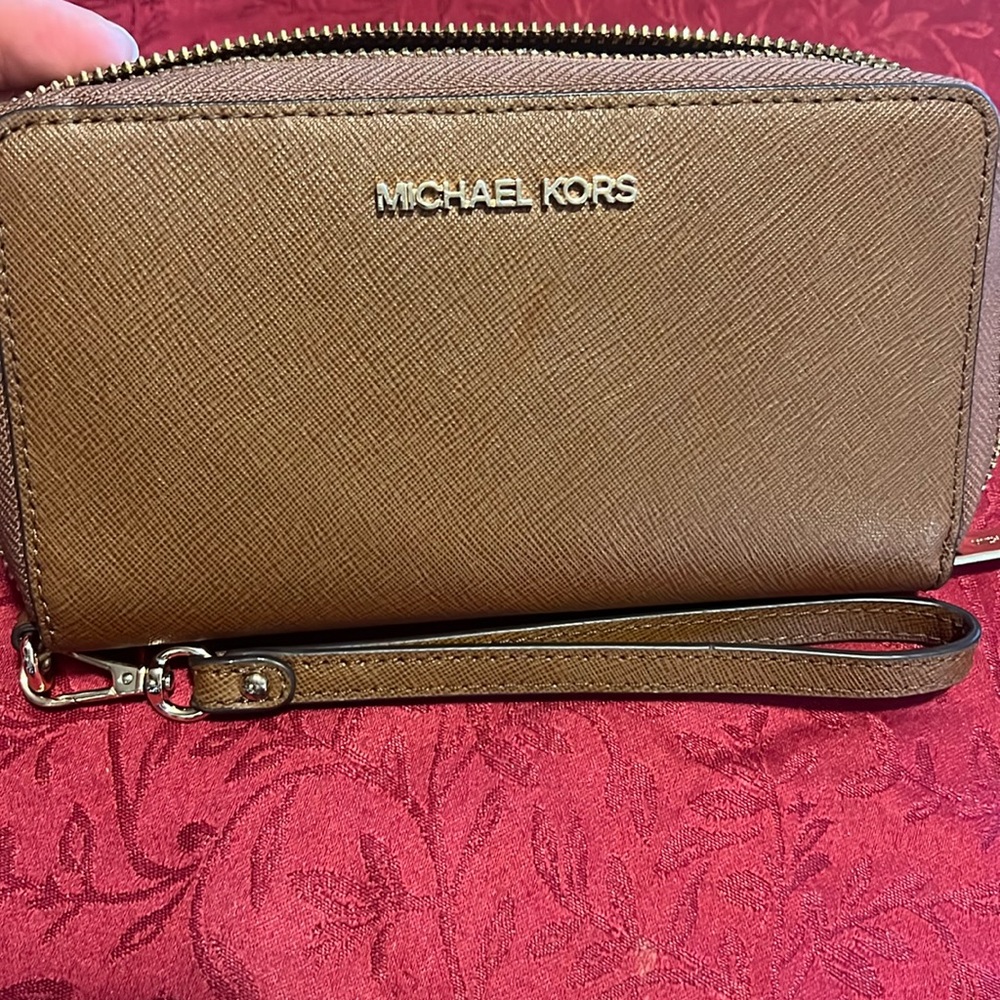 Brown Michael Kors hand wallet